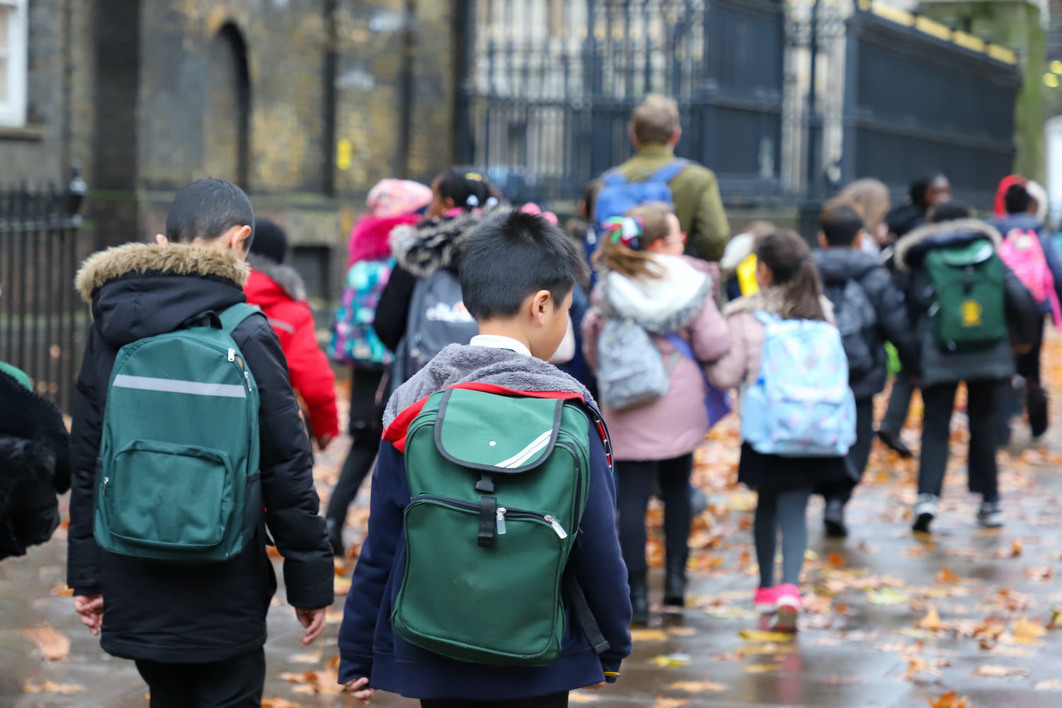 City of westminster, London, Happy school kids (students pupils) on their way to visit British museum