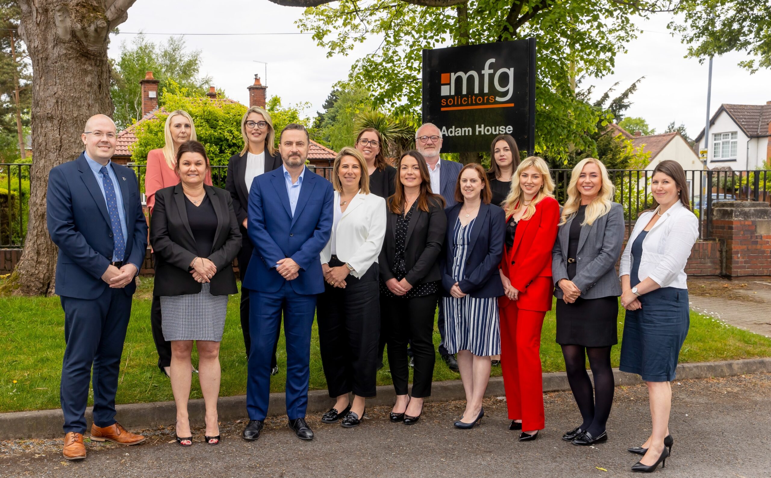 Managing Director, Andrew Davies (front centre) with his the recently promoted colleagues