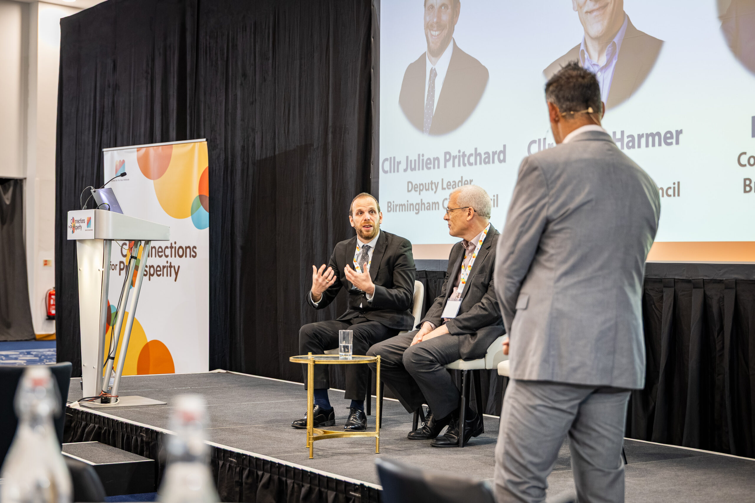 Cllr Julien Pritchard (left) and Cllr Roger Harmer (centre) talking with Phil Upton at Connections for Prosperity 2026.jpg
